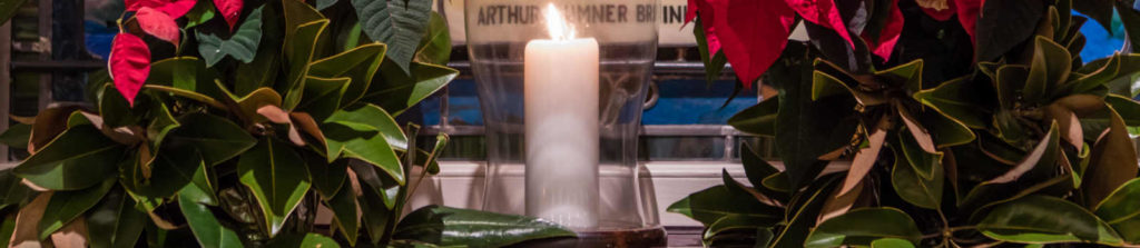 pointsettas and candle