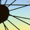 Mindful Biking bicycle wheel spokes and sky