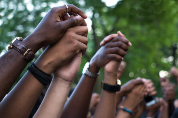 beloved community hands